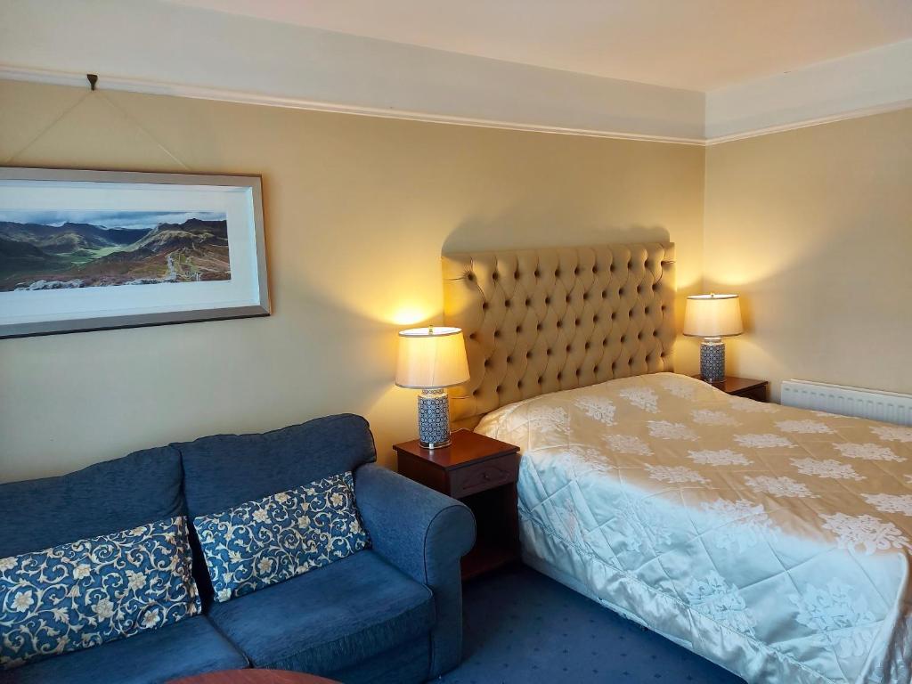 Letto o letti in una camera di Belvedere Lodge