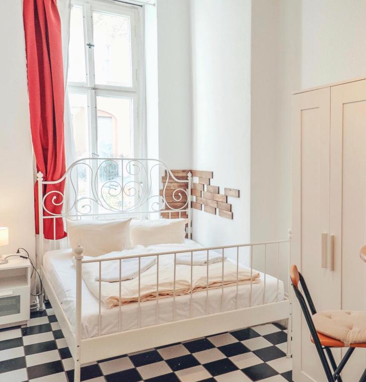 Postel nebo postele na pokoji v ubytování BackpackerBerlin