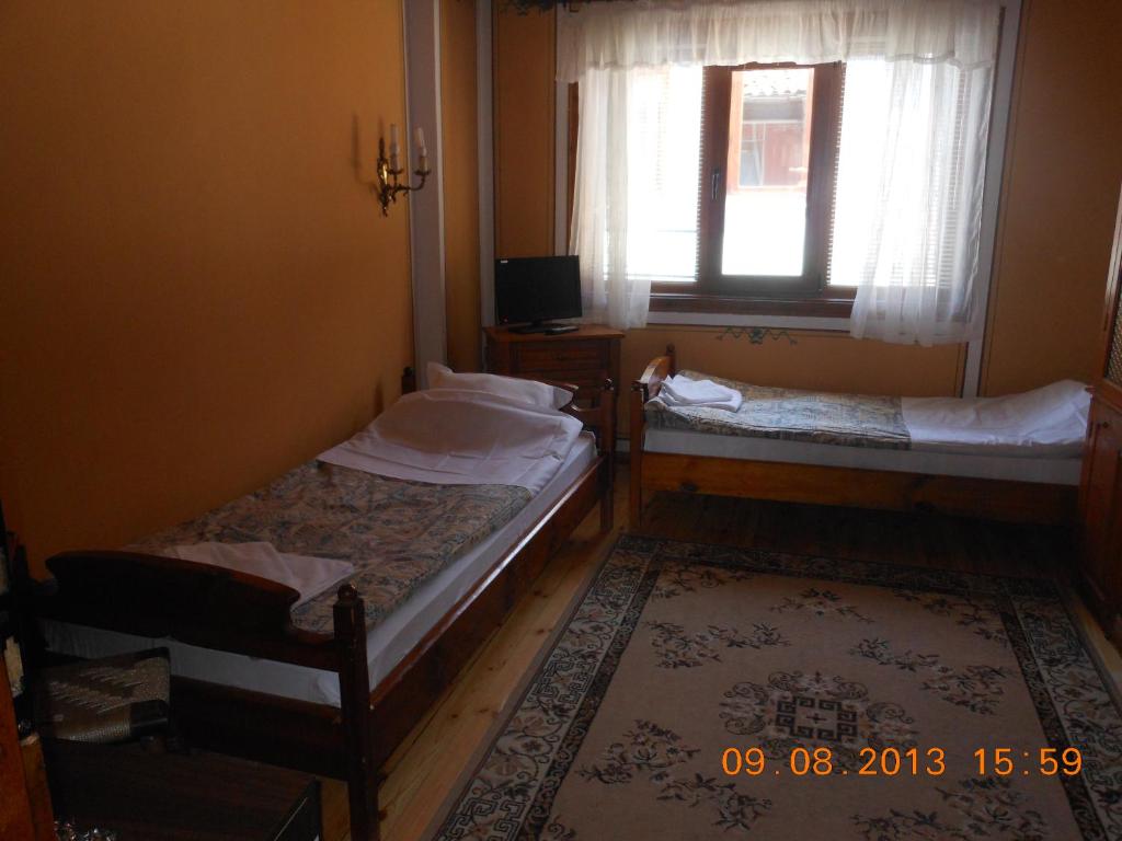 Postel nebo postele na pokoji v ubytování Family Hotel Kalina