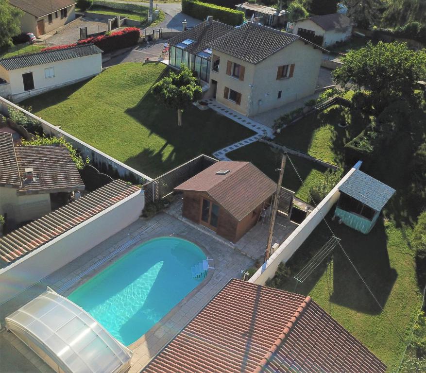 an aerial view of a house with a swimming pool at Chambre d'hôtes Tardy in Saint-Michel-sur-Savasse