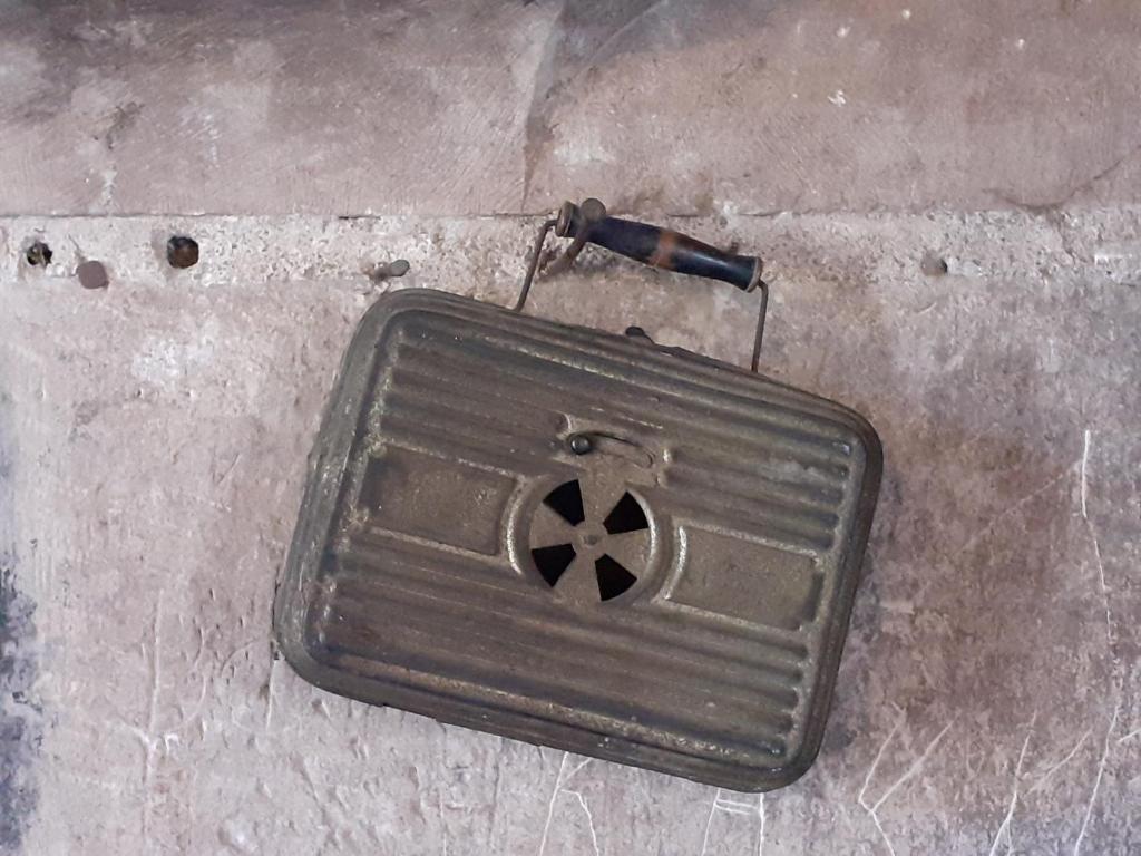 a metal box on the ground with a pipe at Chateau de Chémery in Chémery
