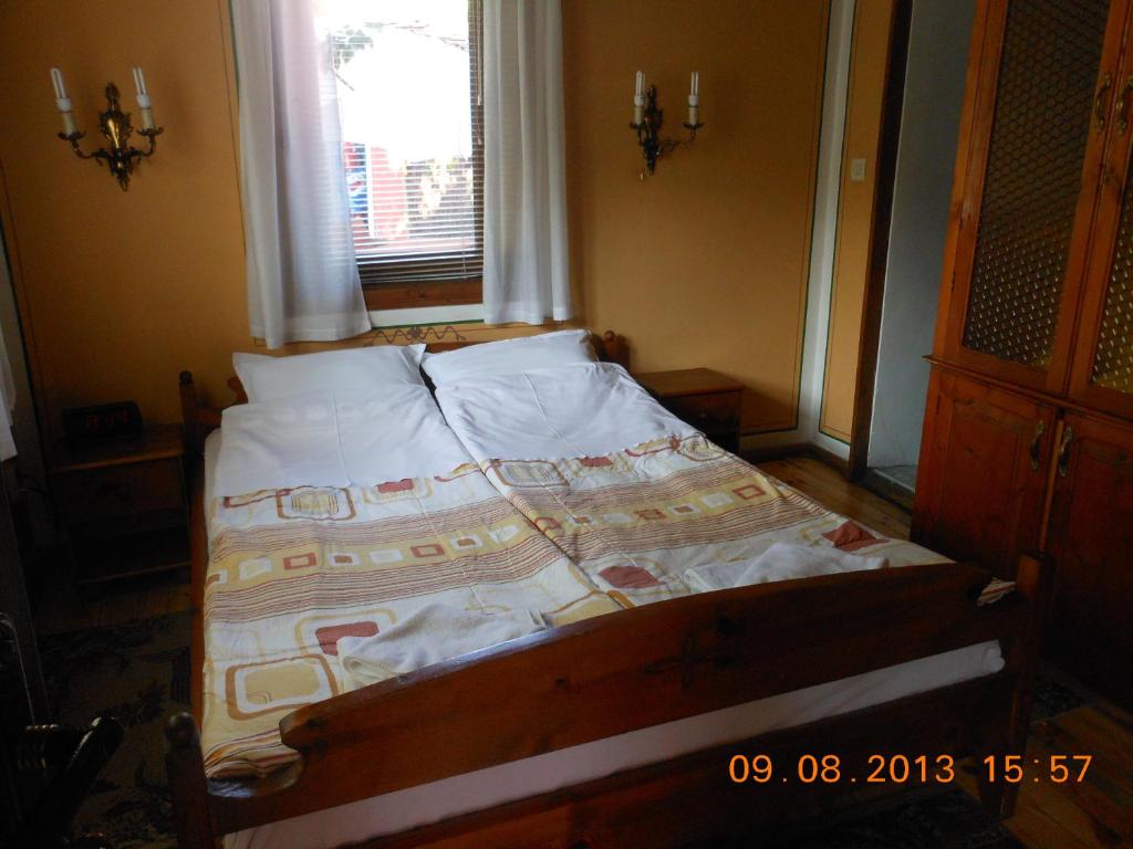 Postel nebo postele na pokoji v ubytování Family Hotel Kalina