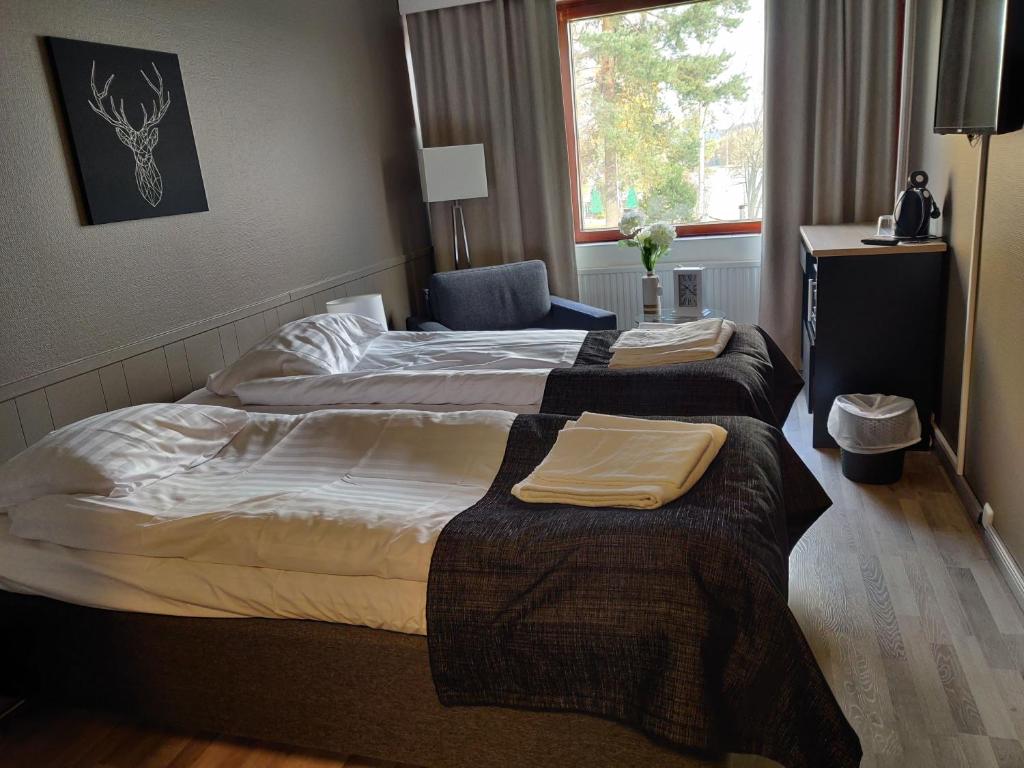 Rooms at Ellivuori - Twin Room With Bathroom