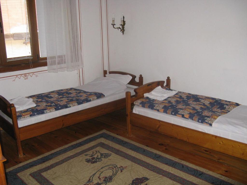 Postel nebo postele na pokoji v ubytování Family Hotel Kalina