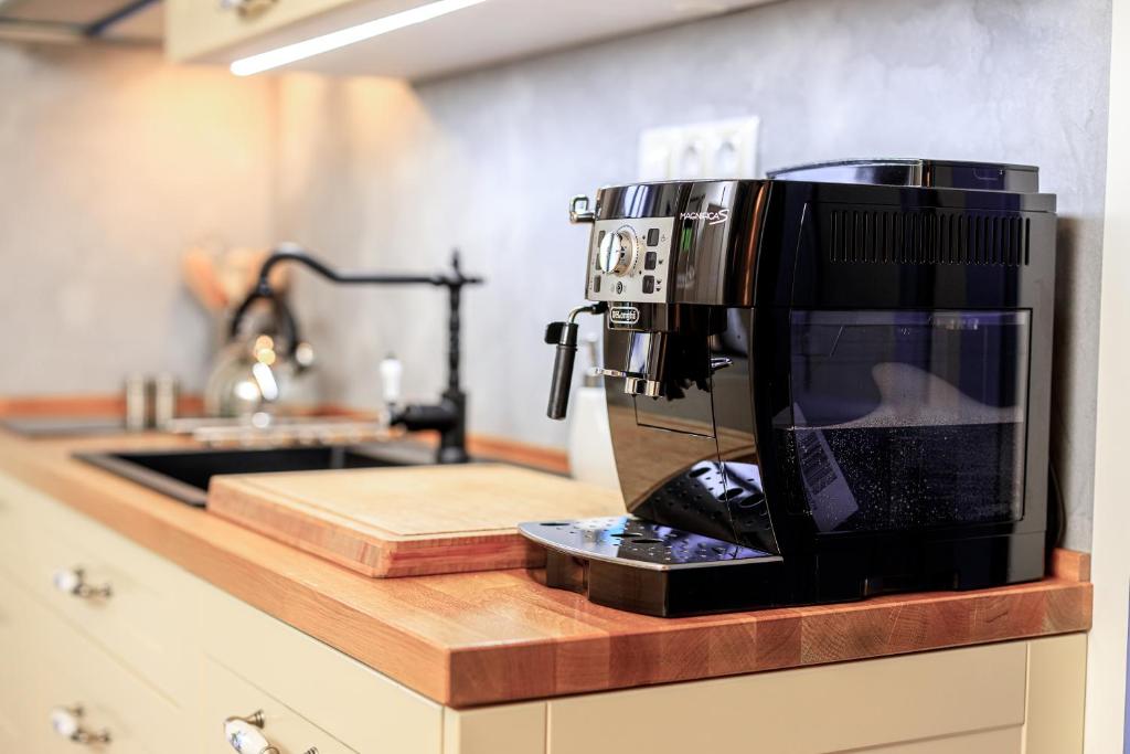 Kuchyň nebo kuchyňský kout v ubytování Apartmány Jožák