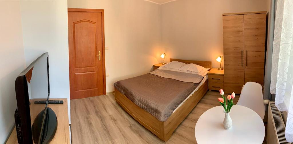 Posteľ alebo postele v izbe v ubytovaní Portowa 35