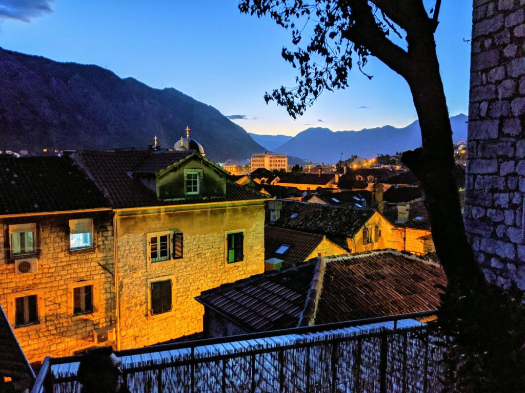 uitzicht op een stad met bergen op de achtergrond bij Best view! Rooftop with Garden - Old Town Nr404 in Kotor