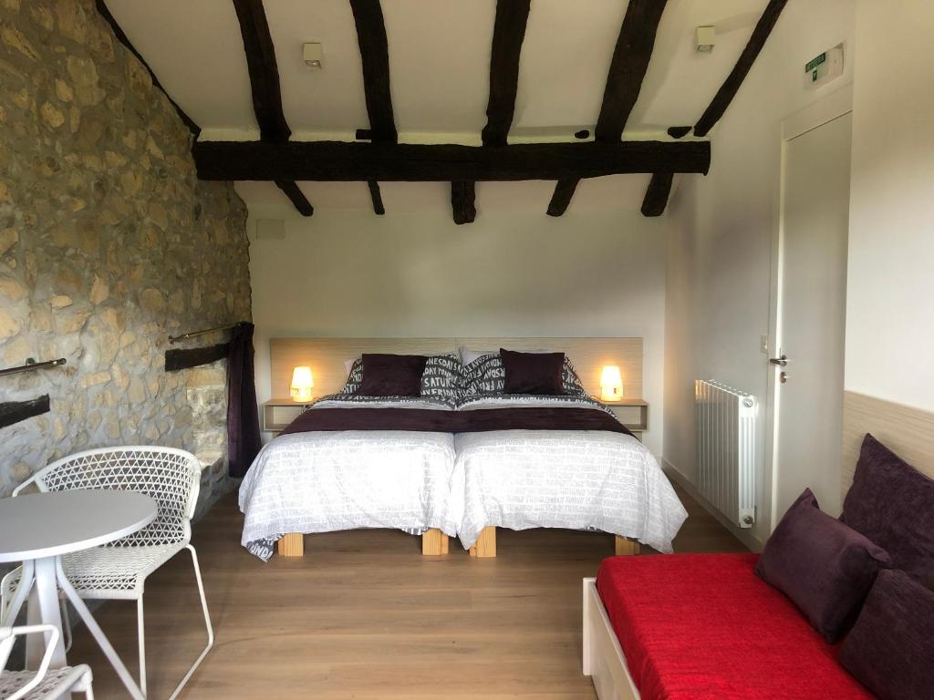 Postel nebo postele na pokoji v ubytování Casa Rural Martiamuno Landetxea