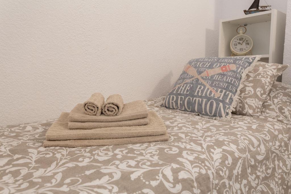 Posteľ alebo postele v izbe v ubytovaní Apartamentos Stil Mar Anna - Stil Mar Jardin Anna
