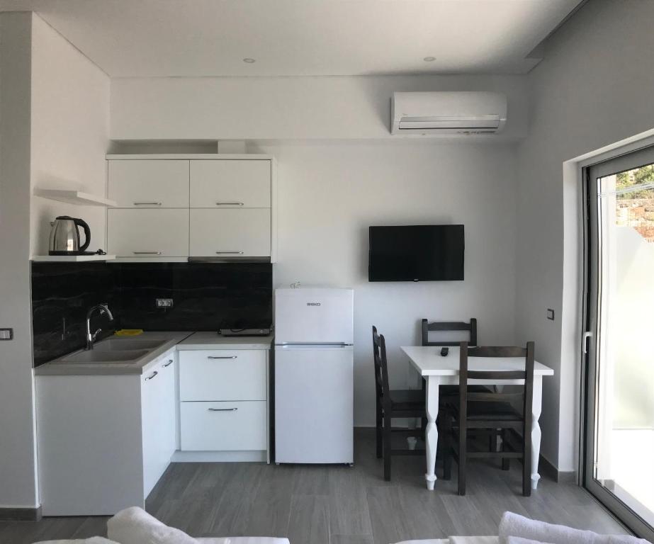 Kuchyň nebo kuchyňský kout v ubytování Edina by Hp Hotel