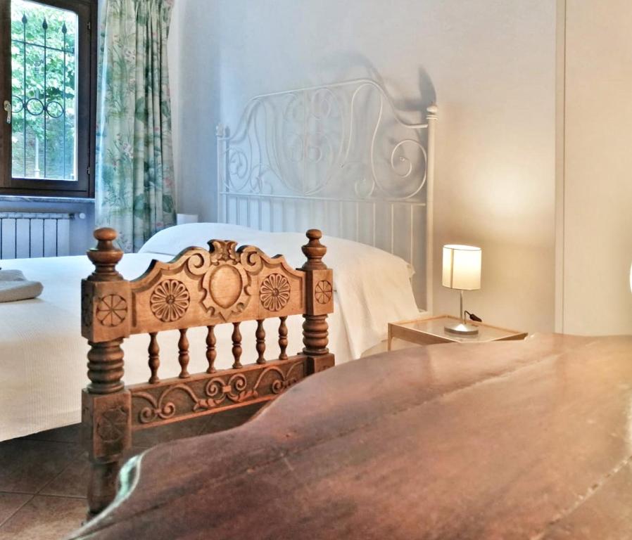 Postel nebo postele na pokoji v ubytování Villa Belvedere Langhe