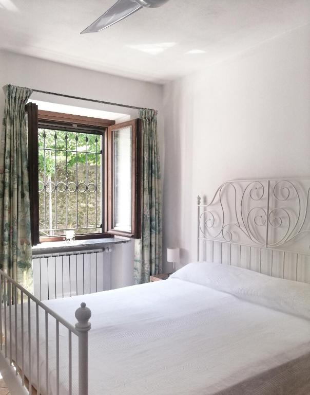 Postel nebo postele na pokoji v ubytování Villa Belvedere Langhe