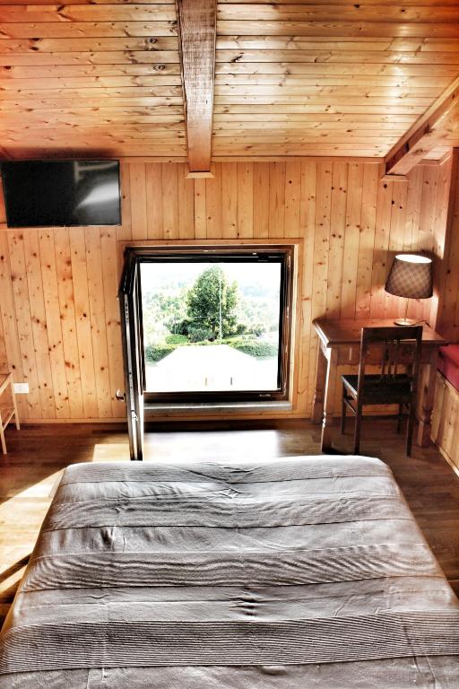 Postel nebo postele na pokoji v ubytování Villa Belvedere Langhe