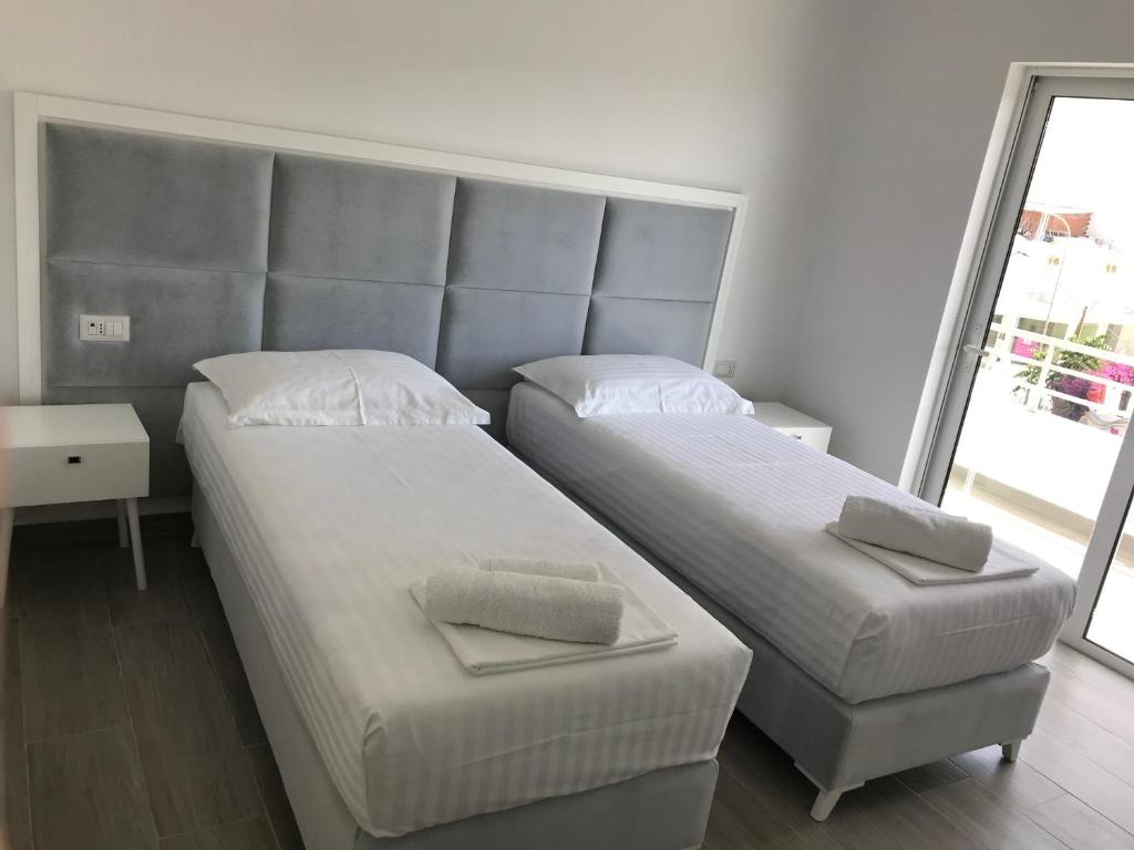 Postel nebo postele na pokoji v ubytování Edina by Hp Hotel