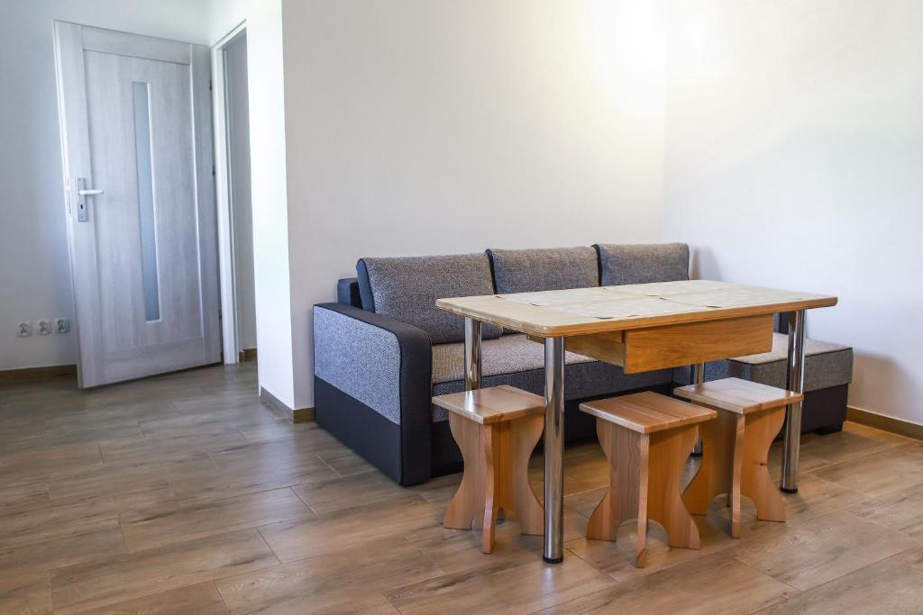 Posedenie v ubytovaní Apartamenty Mazury