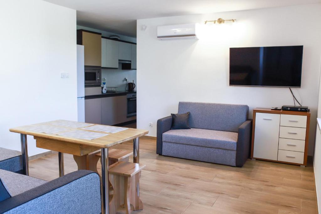 Kuchyňa alebo kuchynka v ubytovaní Apartamenty Mazury