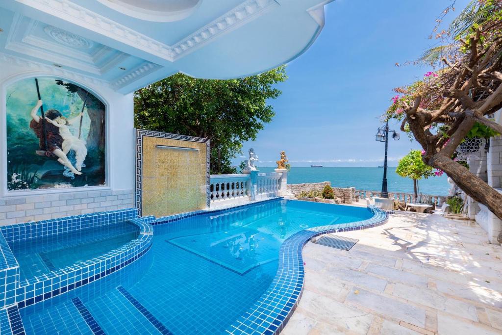 Hồ bơi trong/gần Beachfront Palm Villa 25 Biệt Thự Trên Bãi Biển