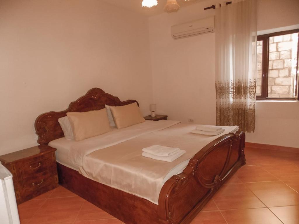 Postel nebo postele na pokoji v ubytování Guest house Naser