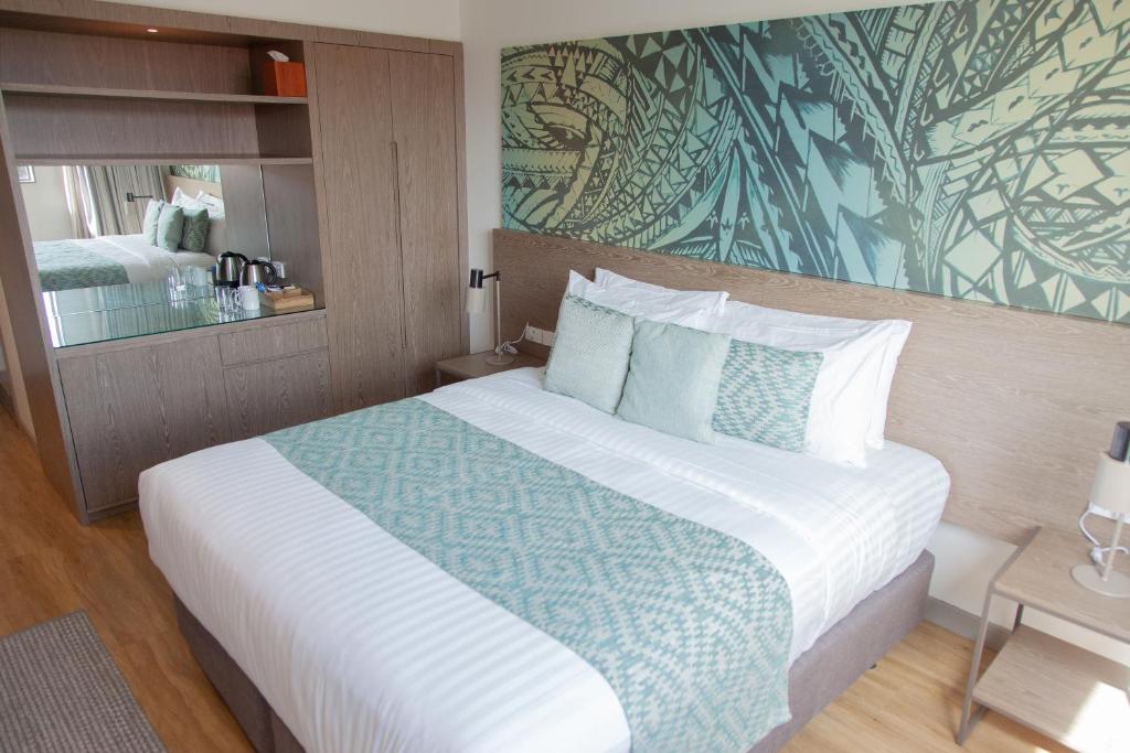 Postel nebo postele na pokoji v ubytování Lava Hotel