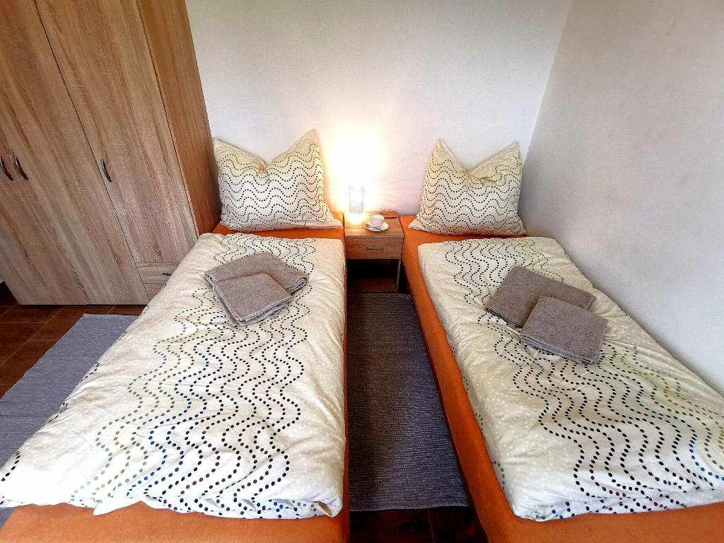 Postel nebo postele na pokoji v ubytování Penzion U Juráše