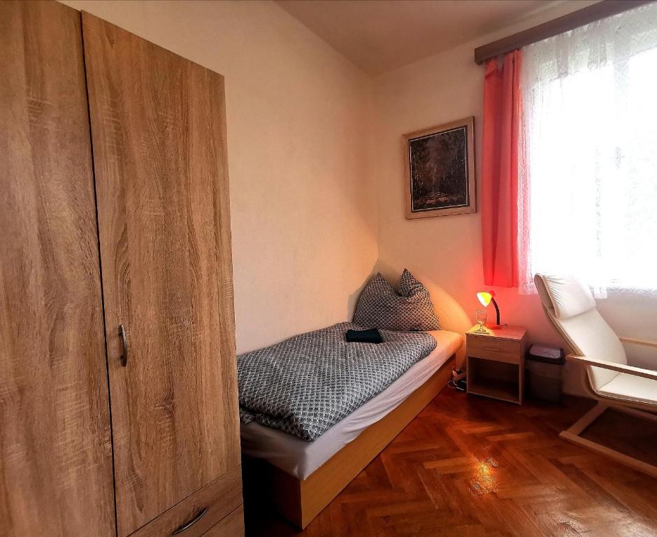 Postel nebo postele na pokoji v ubytování Penzion U Juráše