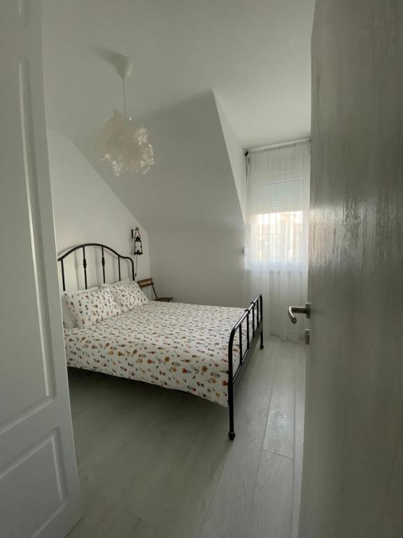 Voodi või voodid majutusasutuse Apartman "Noa" toas