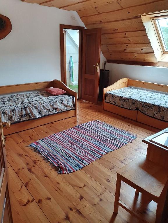 Postel nebo postele na pokoji v ubytování Penzión u Čupku