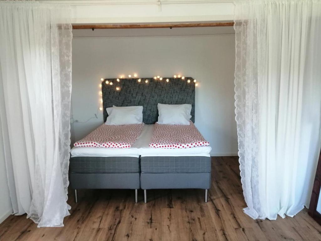 Postel nebo postele na pokoji v ubytování Bottna Inn