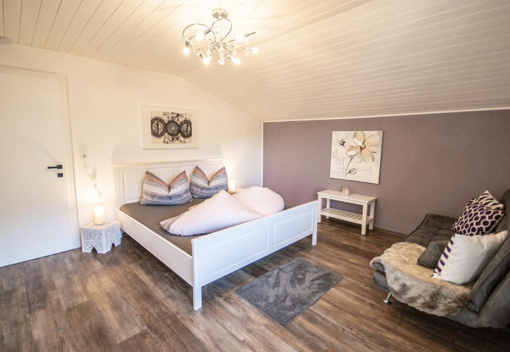 Postel nebo postele na pokoji v ubytování Appartement Zeitlos. °18