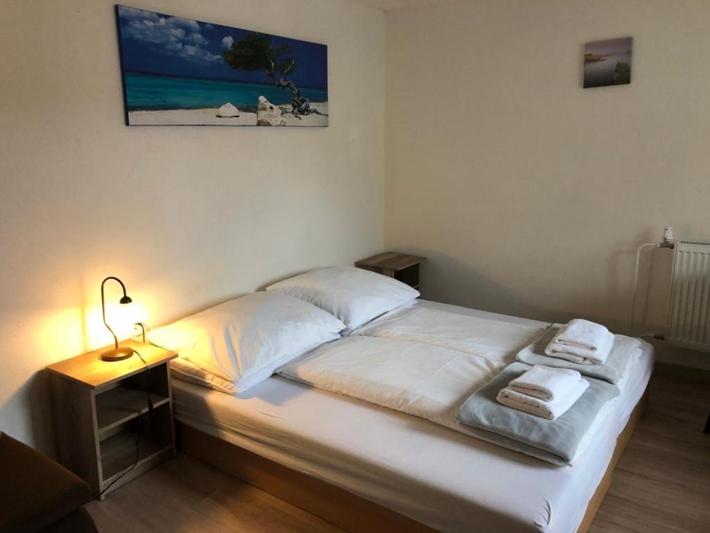 A bed or beds in a room at PODHÁJSKA 110