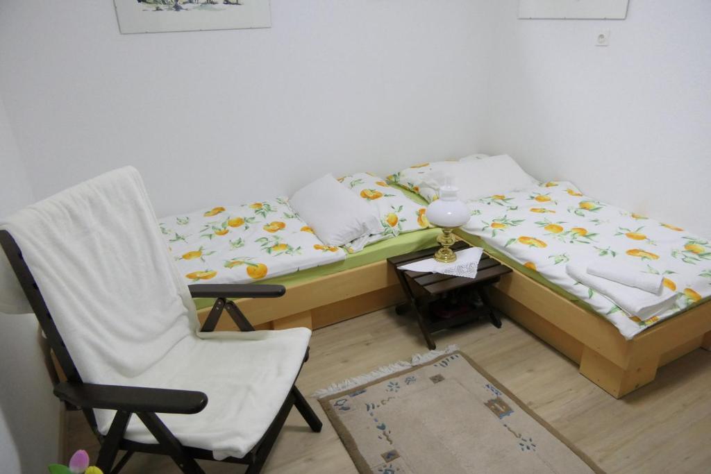 Postel nebo postele na pokoji v ubytování Apartments and rooms Brunko