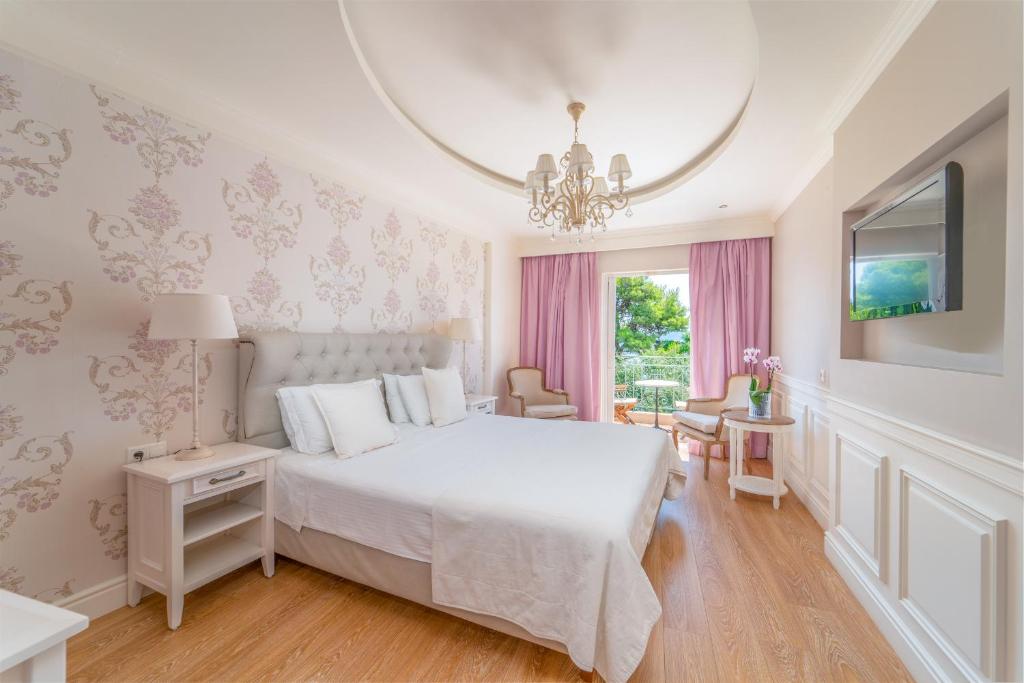 Postel nebo postele na pokoji v ubytování Orion Hotel