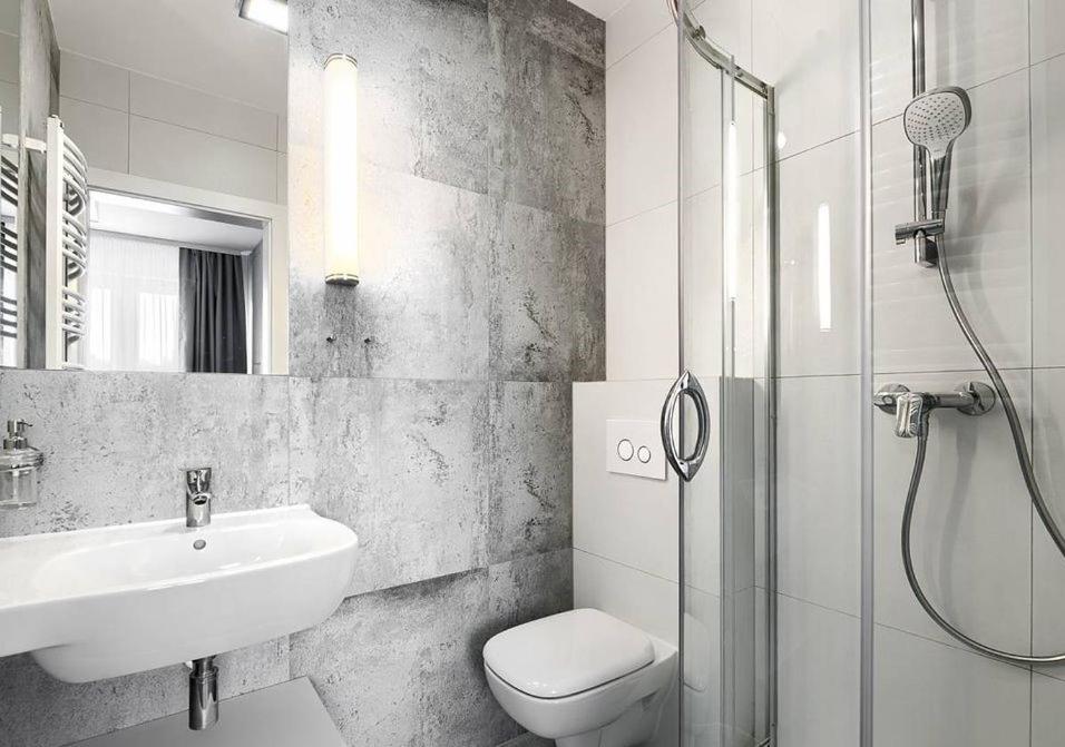 Koupelna v ubytování Szymański Holiday Rooms