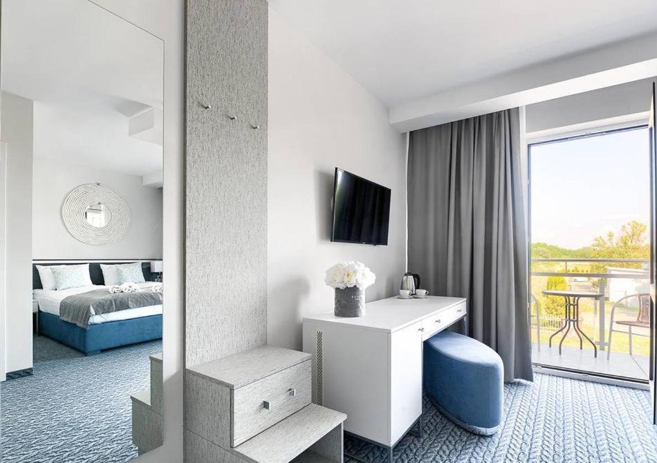 Postel nebo postele na pokoji v ubytování Szymański Holiday Rooms