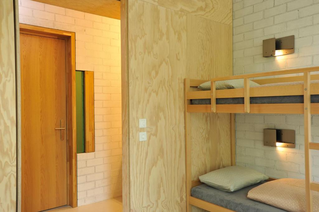 Postel nebo postele na pokoji v ubytování Basel Youth Hostel