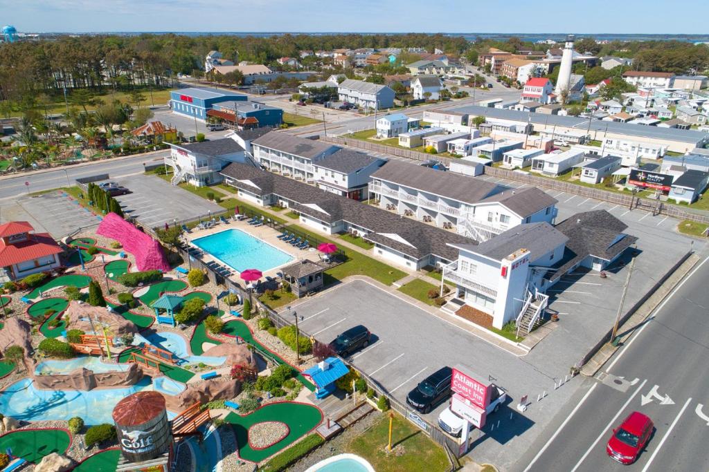 an aerial view of a resort with a swimming pool at Atlantic Coast Inn in Fenwick Island