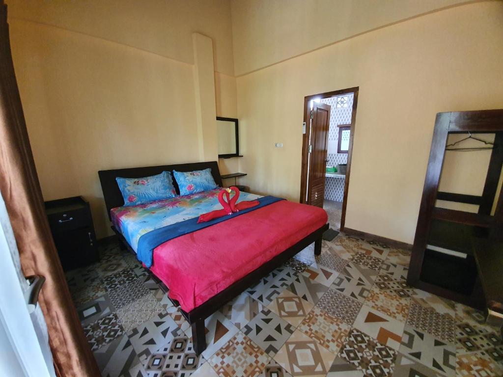 Letto o letti in una camera di Botchan Hostel
