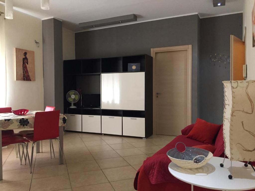 a living room with a couch and a table at Casa Letizia in Lercara Friddi