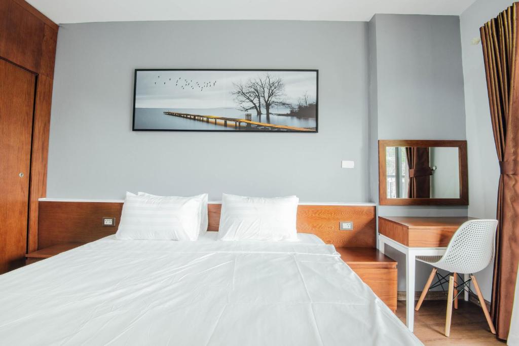 Postel nebo postele na pokoji v ubytování Catba Buffalo Hostel