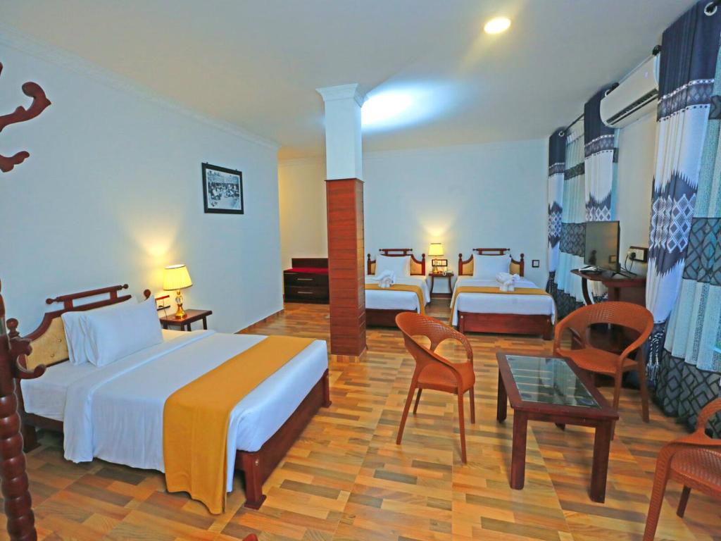 Postel nebo postele na pokoji v ubytování Centauria Hill Resort