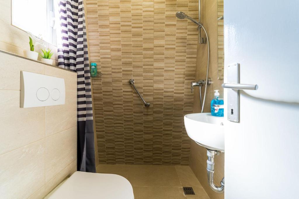 Koupelna v ubytování Apartment Mo-Mo