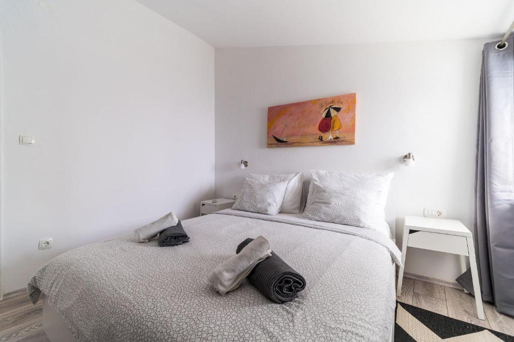 Postel nebo postele na pokoji v ubytování Apartment Mo-Mo
