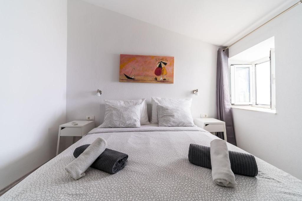 Postel nebo postele na pokoji v ubytování Apartment Mo-Mo