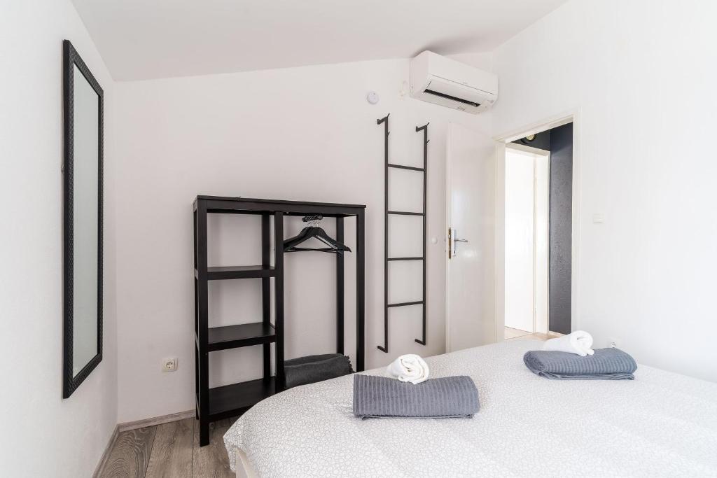 Postel nebo postele na pokoji v ubytování Apartment Mo-Mo