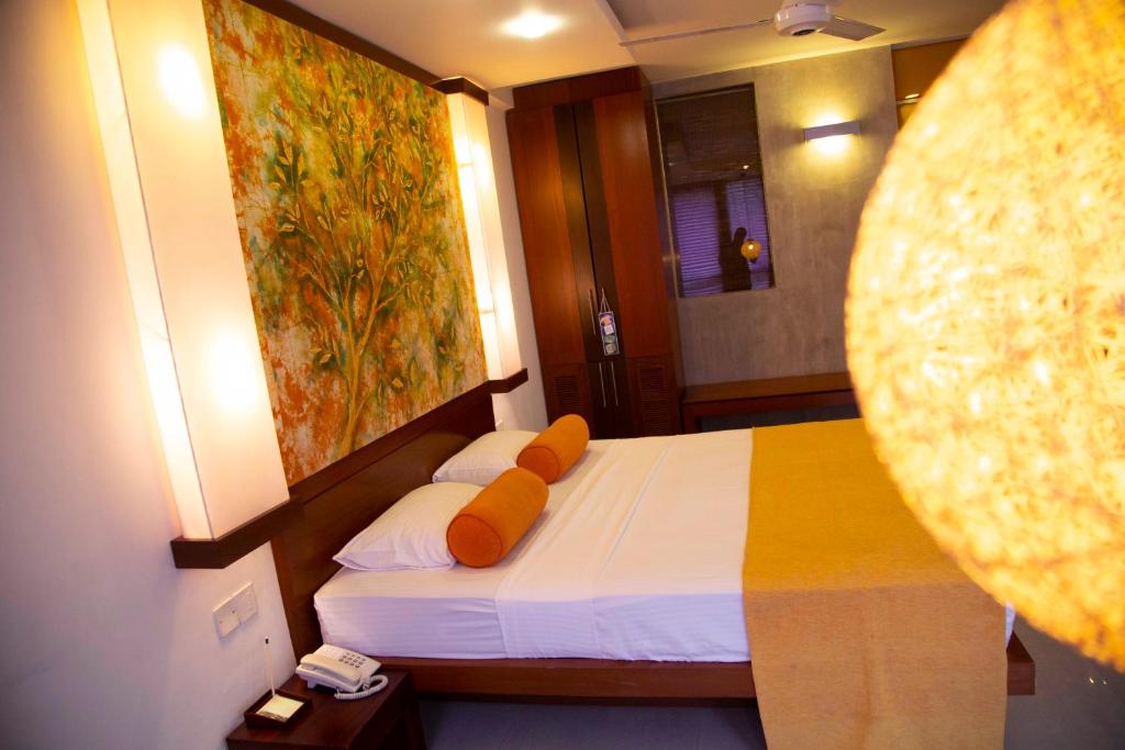 Postel nebo postele na pokoji v ubytování Hotel Topaz