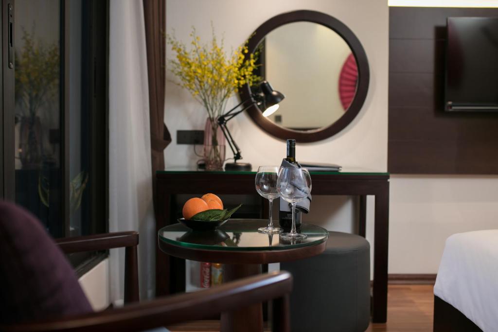 Posteľ alebo postele v izbe v ubytovaní Hanoi Fiesta Hotel & Spa