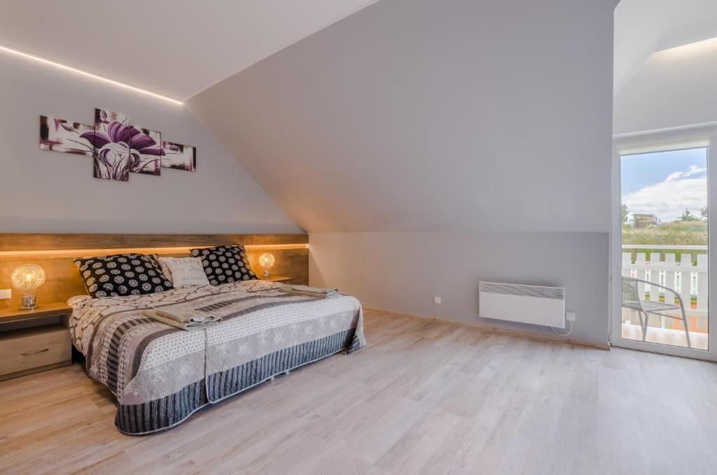 Postel nebo postele na pokoji v ubytování Villa Bryza
