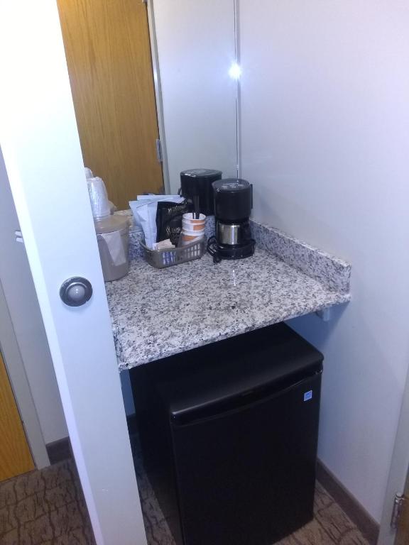Kuchyň nebo kuchyňský kout v ubytování Econo Lodge