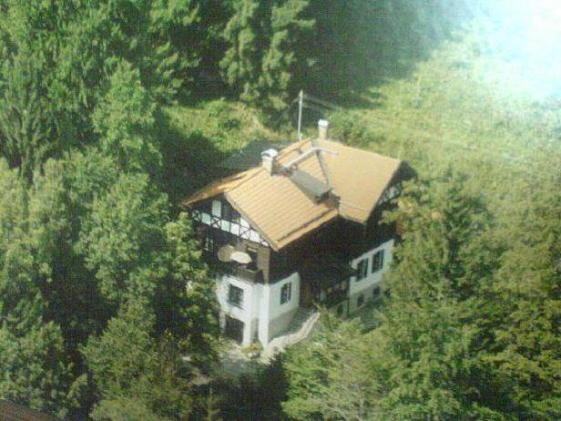 an aerial view of a house in the trees at Jagdschloessl-Tegernsee-Schliersee in Schliersee