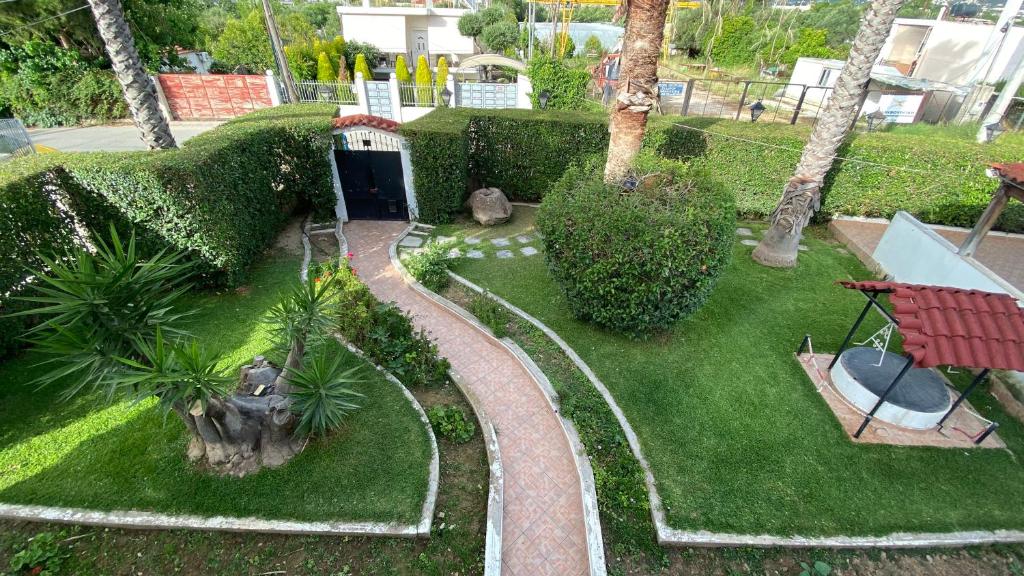 an aerial view of a garden with a train at Patras White Castle in Patra